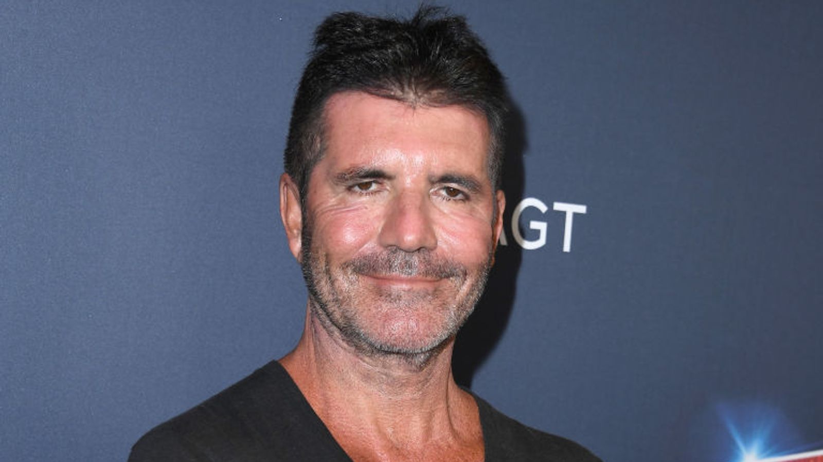 Simon Cowell breaks his back while testing electric bicycle