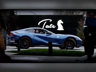 Romanian police seize luxury cars from Andrew Tate's property